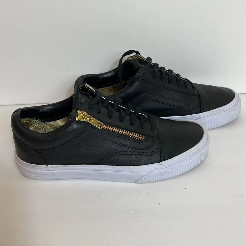 Vans Old Skool black leather sneakers women size: 6; men: 4.5